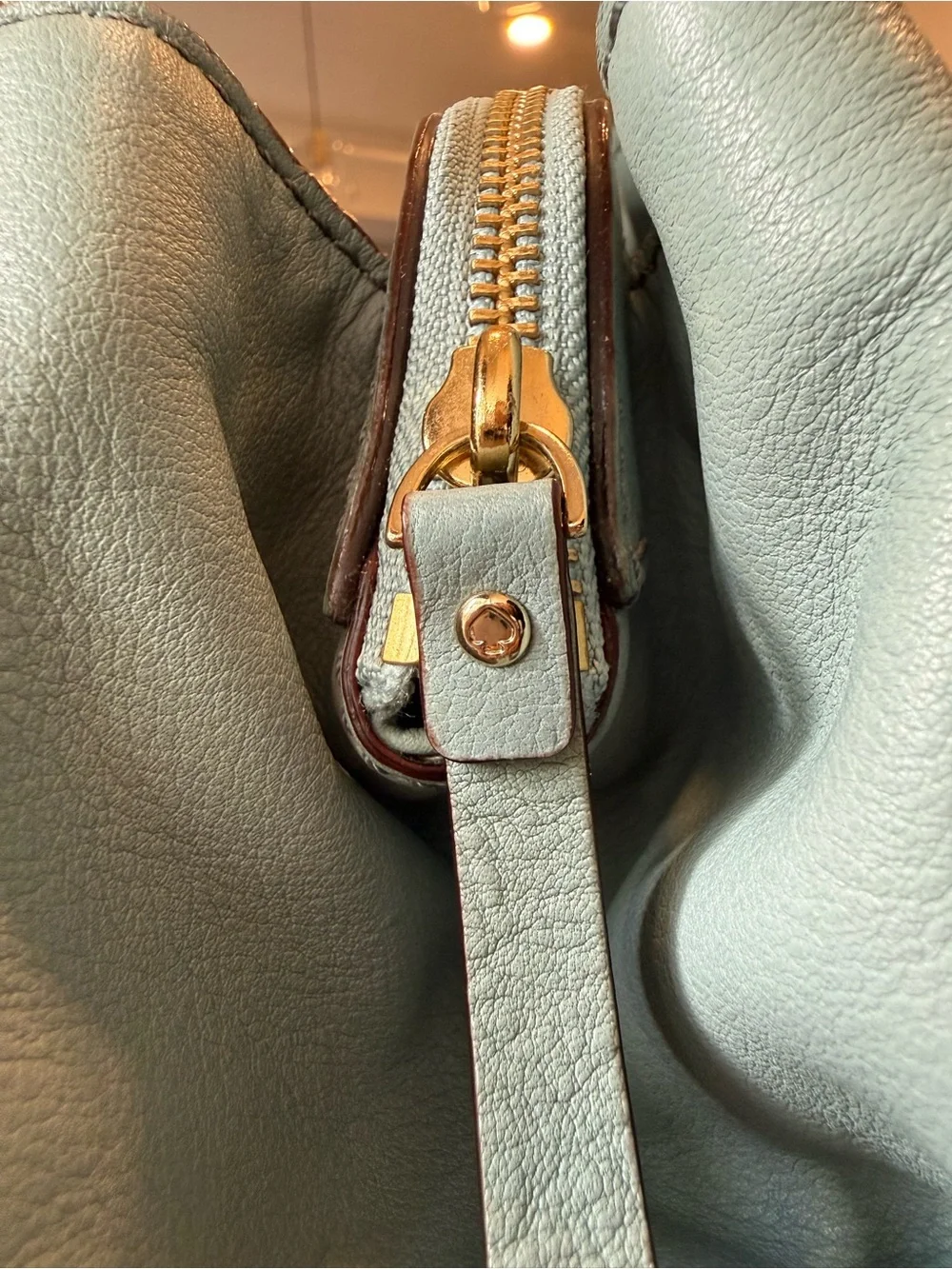 kate spade light blue leather satchel with gold toned hardware